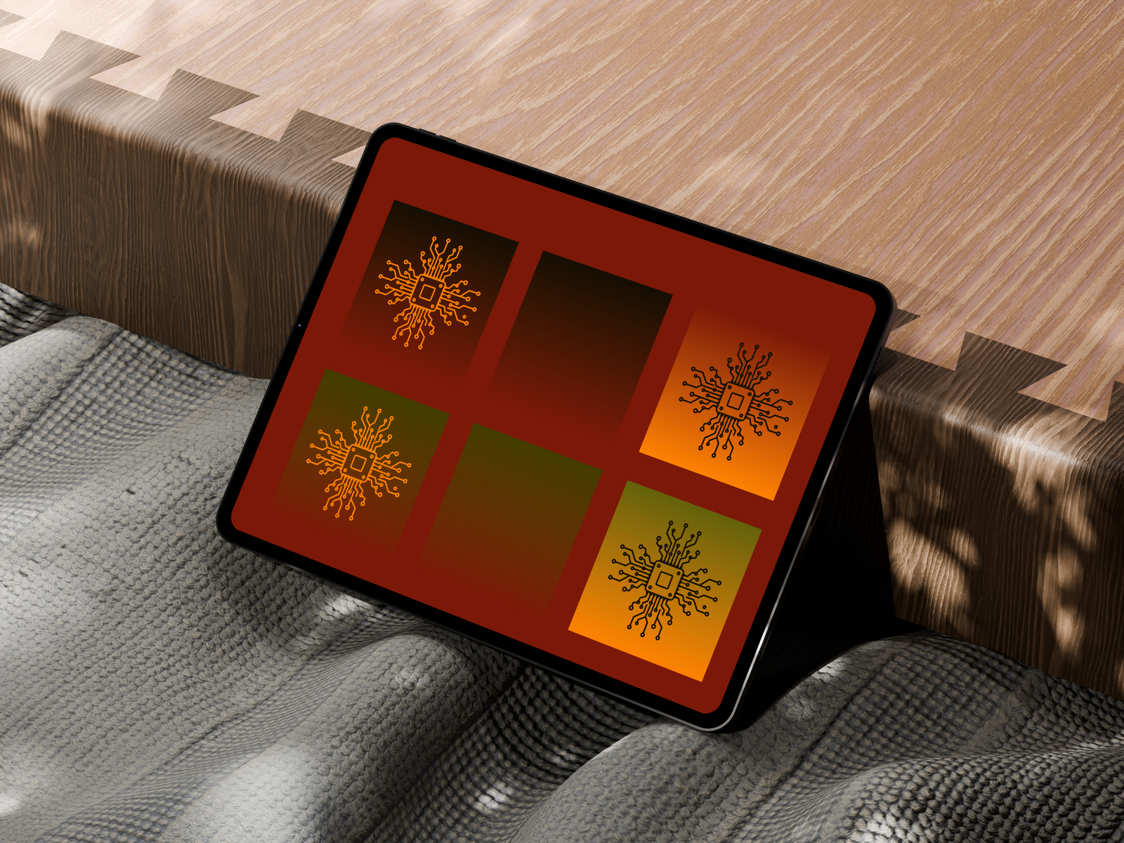 Motif grid on an iPad, on textured fabric and wood