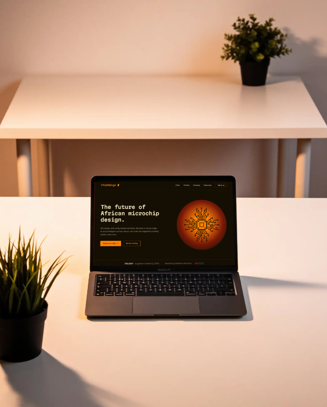 The ChipMango hero on a MacBook, on a desk